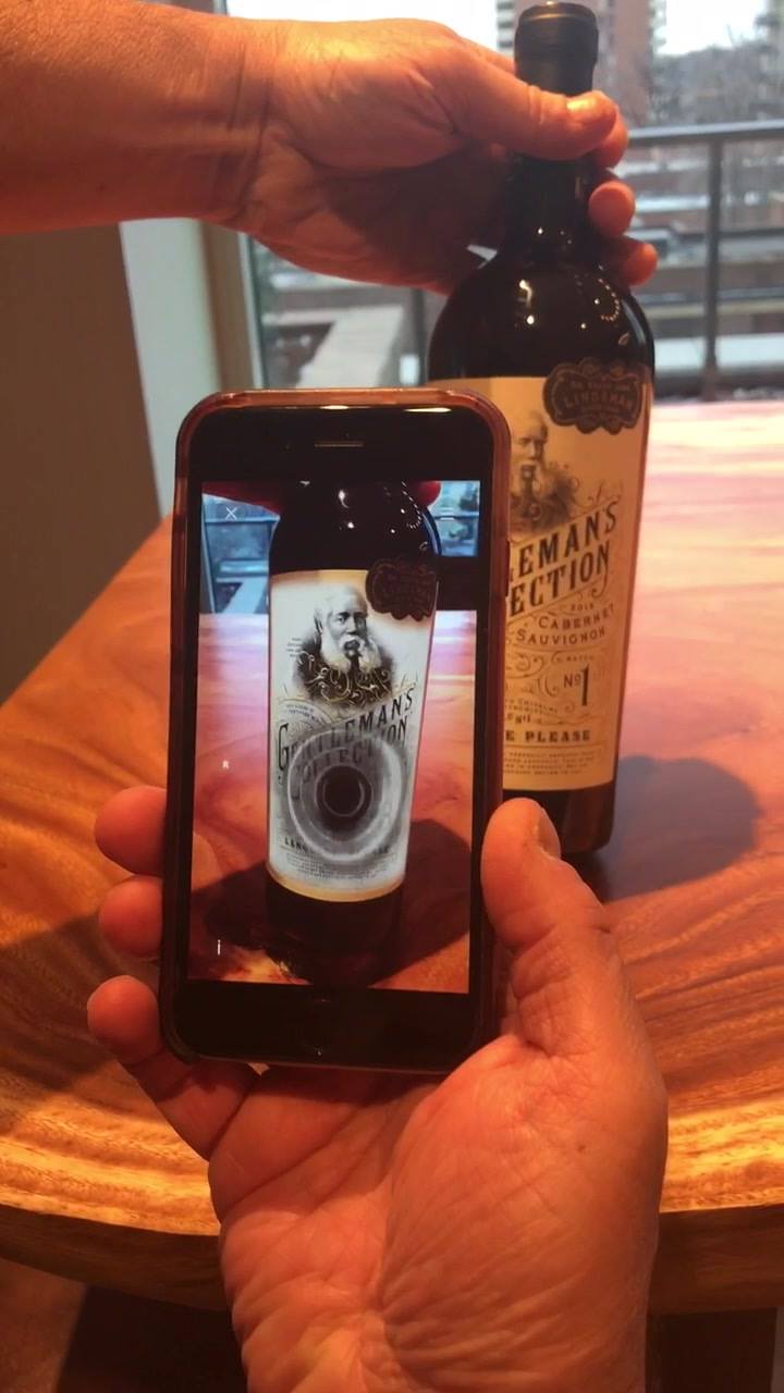 Want to see an awesome use of augmented reality? Check out what happens when I use the Living Wine Labels app on this bottle of Gentleman’s Collection.