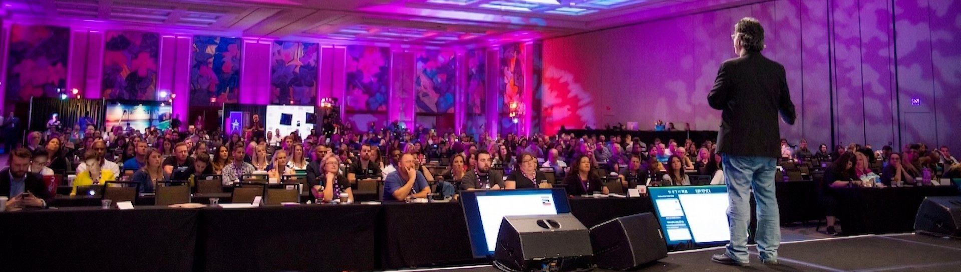 Joel Comm AI keynote speaker on stage